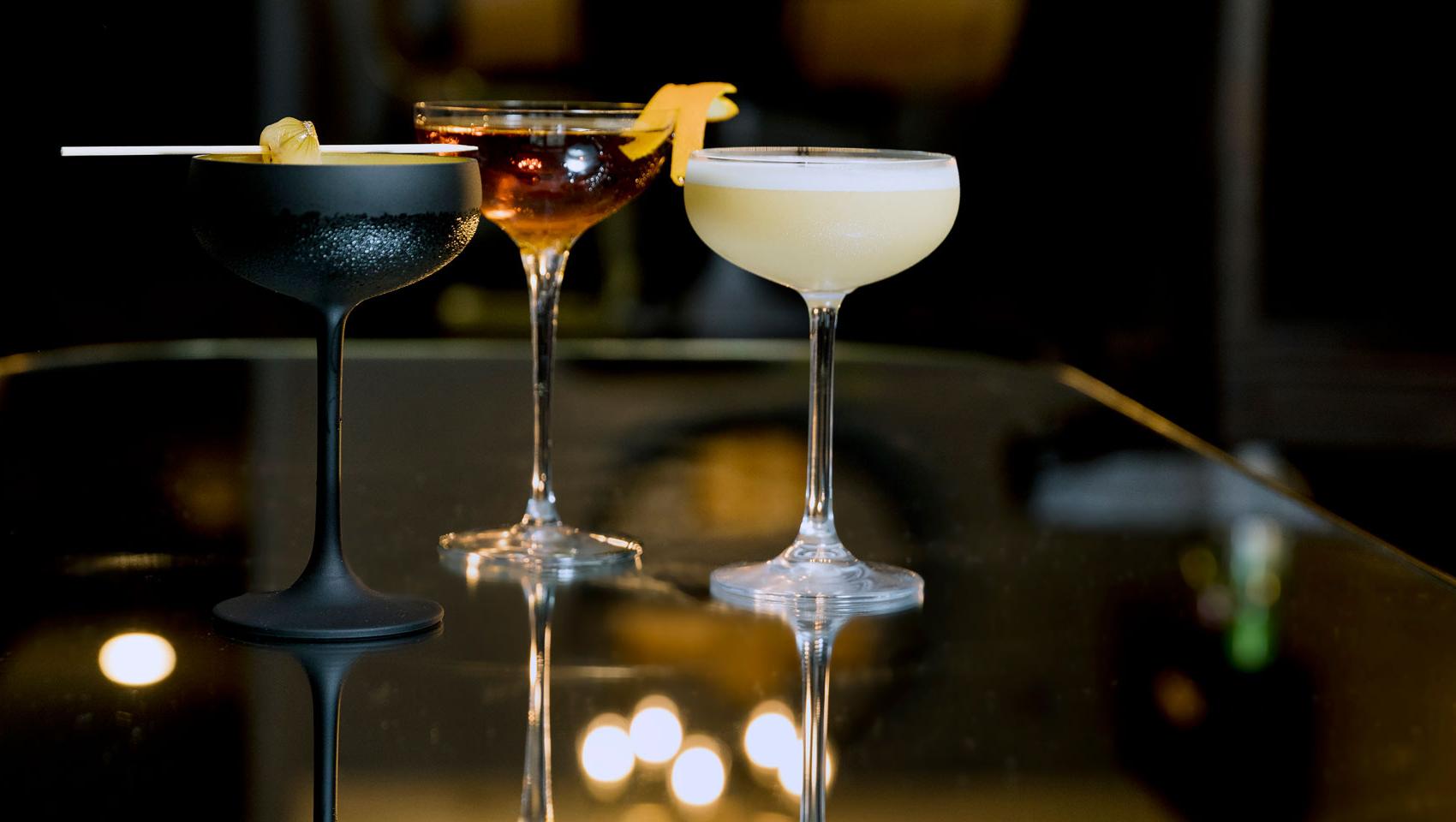 Three cocktails on a bar at a Kimpton Restaurant